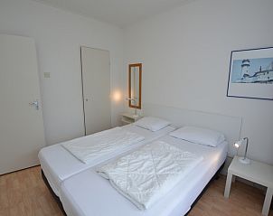Bedroom in Apartment Kerckeland 126, De Koog, Texel, with double bed and quiet atmosphere.