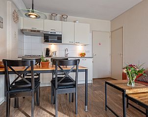 Modern kitchen in Motel Texel Apartment with bath (B), De Koog, Texel with dining area and cooking facilities.