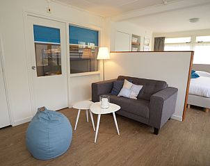 Stylish indoor space in Grand Hotel Opduin - Holiday Apartment B, De Koog, Texel with modern decor and spacious layout.