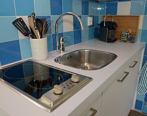 Modern kitchen in Grand Hotel Opduin - Holiday home B, De Koog, Texel with stylish appliances and functional design.