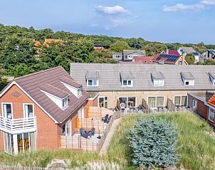 Aerial photo of Vogelweelde vacation home, De Koog, Texel, surrounded by green nature.