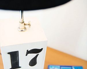 Stylish lamp in Villa 6, vacation home in De Koog Texel, atmospheric details on the Wadden Islands.