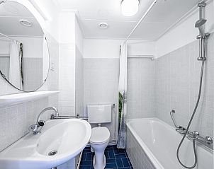 Fresh bathroom in Two persons apartment large - second floor, De Koog, Texel with bath and shower.