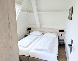 Cozy bedroom with two beds in Two persons apartment large - second floor, De Koog, Texel.