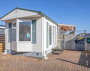 Chalet Bregkoog 27 in De Koog, Texel mit einer einladenden Terrasse fr einen entspannten Aufenthalt auf den Watteninseln.