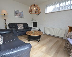 Intimate sitting area in Holiday Home Stappeland 205, De Koog, Texel with comfortable sofas and cozy furnishings.