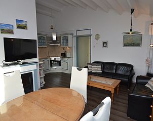 Open kitchen and living room in Motel Texel - Apartment 315/1T, De Koog, Texel, ideal for family stays.