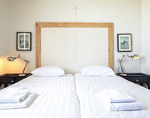 Comfortabele slaapkamer in Appartement - 4-persoons (1533) in De Koog, Texel, perfect voor een ontspannen nachtrust.