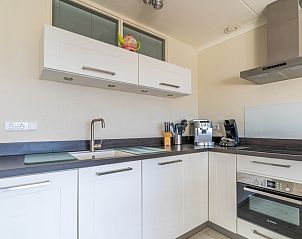 Modern kitchen in Apartment Juliana 148 Island and Sea View, De Koog, Texel with complete appliances and sleek finish.
