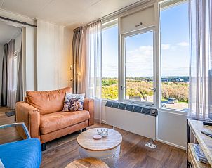 Spacious living room with comfortable seating in Apartment Juliana 172 Eilandzicht, De Koog Texel, ideal for a vacation.
