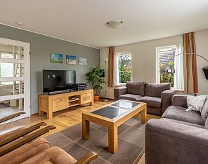 Cozy sitting area in Holiday home Honeysuckle 43 with sauna in De Koog, Texel, ideal for relaxation after a day on the island.