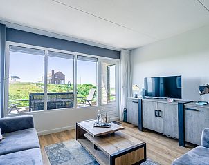 Cozy living room in Apartment Juliana 042 with beautiful views of nature in De Koog, Texel, Wadden Islands.