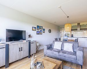 Open-plan living and dining area in Apartment Juliana 042, located in De Koog, Texel, with modern facilities.