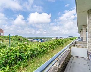 Balcony of Apartment Juliana 042, De Koog, Texel, with beautiful views of the sea and nature of the Wadden Islands.