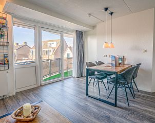 Bright dining area with a view in Apartment Zeedistel 20, De Koog, Texel, ideal for relaxed meals.