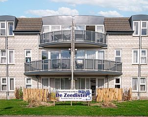 Exterior of Apartment Zeedistel 24, De Koog, Texel with balcony.