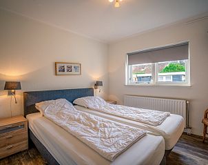 Bright double bedroom in Orchismient 2, vacation home De Koog, Texel for relaxing stay.