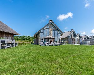 Villa 189 with Hot tub in De Koog, Texel offers lovely garden views from the vacation home.