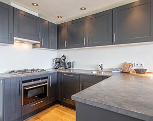 Fully equipped kitchen in Apartment - 4-bed (1535) in De Koog, Texel, ideal for self-catering vacations.