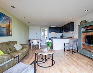 Cozy living room in Apartment - 4-bed (1535), De Koog, Texel with comfortable seating and modern furnishings.