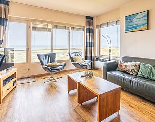 Apartment Juliana 168 Zeezicht in De Koog Texel with panoramic sea views from the living room.