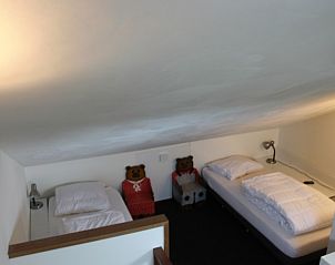 Gezellige kinderkamer in Huize 100-1, vakantiehuis in De Koog, Texel, ideaal voor families.