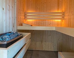 Holzsauna in Tapuit 10a, Ferienhaus in De Koog, Texel fr ultimative Entspannung.
