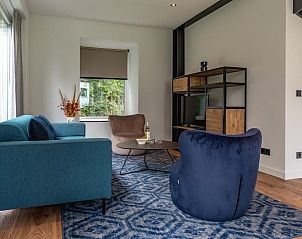 Comfortable sitting area in Kluut 16a vacation home in De Koog, Texel.