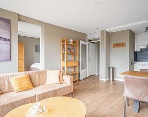 Spacious living room with access to bedrooms in Apartment Juliana 178 Eilandzicht, De Koog, Texel.