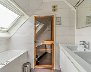 Luxury bathroom with sauna in Holiday home Kamperfoelie 69, De Koog, Texel, for ultimate relaxation.