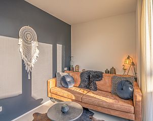 Stylish sitting area in Het Bospad - Brink 15, De Koog, Texel. Ideal for a relaxing stay on the Wadden Islands.