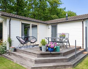 Cozy terrace of Holiday home in De Koog, ideal for outdoor meals, Texel, Wadden Islands.