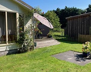 Green garden at Holiday home in De Koog with sunny terrace, Texel, Wadden Islands.