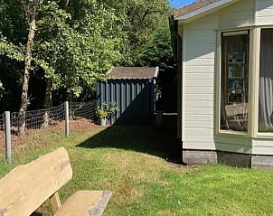 Shady corner of the garden at Holiday home in De Koog, Texel, Wadden Islands.