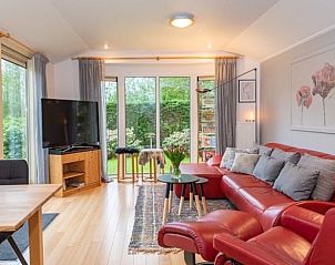 Bright living room of Holiday home in De Koog with comfortable seating area, Texel, Wadden Islands.