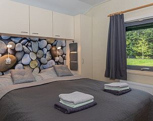 Comfortable bedroom with double bed in Holiday home in De Koog, Texel, Wadden Islands.