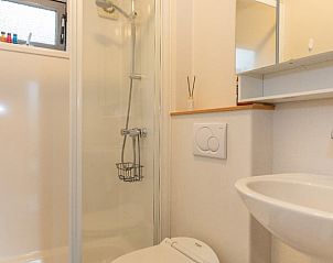 Modern bathroom with shower in Holiday home in De Koog, Texel, Wadden Islands.