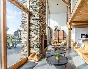 Open living space in Villa 181 with Hot tub, De Koog Texel, overlooking the garden.