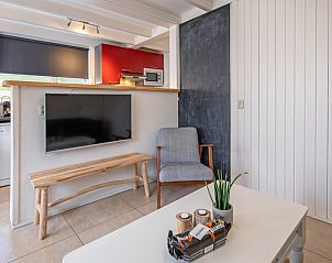 Comfortable sitting room with large windows in 32b Pollux, De Koog, Texel.