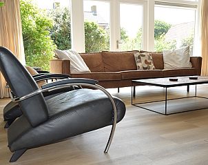 Stylish armchairs in living room of Plevierstraat 24 - Tuunwoal vacation home, De Koog, Texel.