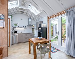 Kche und Essbereich im Ferienhaus Pippa, De Koog, Texel, mit Zugang zum Auenbereich.