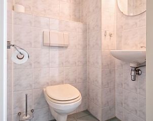 Guest toilet in Resort De Buteriggel - Apartment 9, De Koog, Texel with sleek and modern finish.