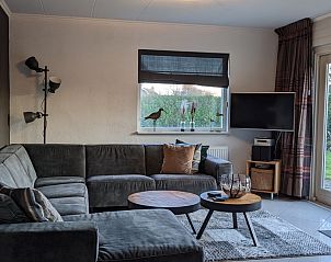 Gemtliches Wohnzimmer von Stappeland - De Duinvlinder, Ferienhaus in De Koog, Texel mit komfortabler Sitzecke.