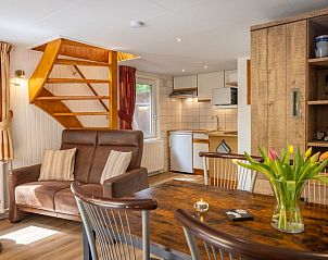 Esszimmer und Kche im Ferienhaus Karekiet, De Koog, Texel, Waddeninseln.