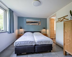 Komfortables Schlafzimmer im Ferienpark Het Oude Dijkje - Vuurcoogh, De Koog, Texel mit ruhiger Aussicht.