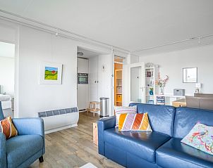 Spacious interior of Apartment Juliana 112 Zeezicht, De Koog, Texel with access to the kitchen and bedroom.