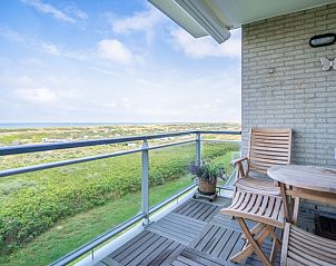Private terrace of Apartment Juliana 112 Zeezicht in De Koog, Texel overlooking the dunes.