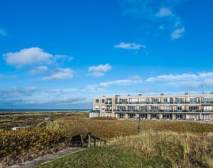 Outside view of Apartment Juliana 112 Zeezicht in De Koog, Texel surrounded by beautiful nature.