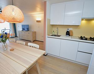 Open kitchen and dining area in Apartments Anna - Sun, De Koog, Texel, perfect for cozy meals.