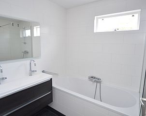 Luxury bathroom in Holiday home Stappeland 76, De Koog, Texel with modern amenities.